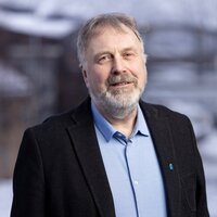 Bildet viser et bilde av avdelingsdirektør Magne Nicolaisen i Tromsø kommune