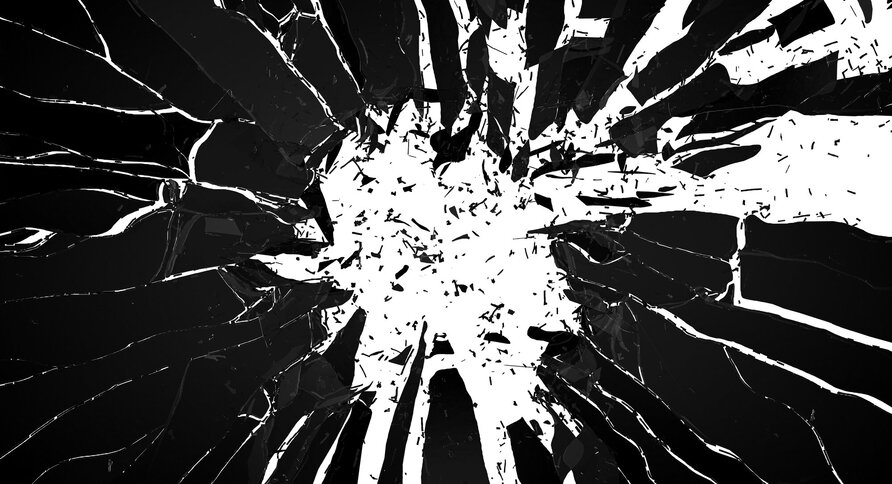 Bildet viser en knust glassrute i sort-hvitt